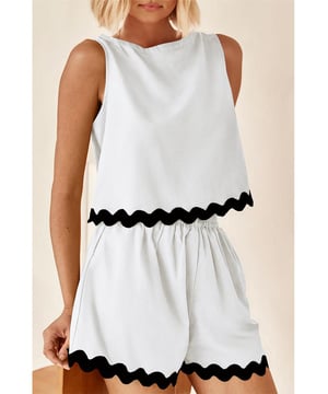 Our styles are designed with a trendy fitted look in mind following an international size standard. For the best fit we suggest choosing one size up from your usual. Be sure to check our sizing chart to find your perfect match!
  Ricrac detail makes the set unique and delicate
  Includes a vest and shorts that can be worn together or separately
  Contrast trim creates a color block vision effect
  Breathable lightweight and comfy fabric
Material: 95% Polyester 5% Elastane