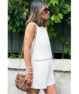 Textured knit fabric adds depth and dimension
  Solid color design for versatility
  Sleeveless tank top for staying cool
  Drawstring shorts for a relaxed adjustable fit
  Ideal for warm weather
  Available in multiple sizes: S M L XL
Material: 100% Polyester