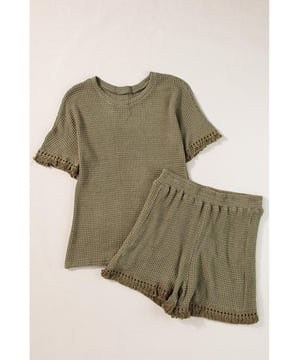 Our styles are designed with a trendy fitted look in mind following an international size standard. For the best fit we suggest choosing one size up from your usual. Be sure to check our sizing chart to find your perfect match!
  Laurel Green Fringe Trim Textured Short Two Piece Set
  Chic boho vibe with fringe trim
  Unique and fashionable textured fabric
  Includes a tee and shorts
  Stylish and comfortable
  Ideal for daily and casual occasions
Material: 67% Polyester 30% Viscose 3% Elastane