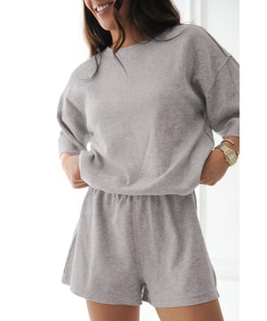 Solid color design offers a timeless and versatile look
  Loose tee provides a relaxed and comfortable fit on hot days
  Set includes matching shorts for a coordinated and effortless style
  Made from soft breathable fabric for all
  day comfort
Material: 75% Polyester 20% Viscose 5% Elastane