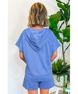 Our styles are designed with a trendy fitted look in mind following an international size standard. For the best fit we suggest choosing one size up from your usual. Be sure to check our sizing chart to find your perfect match!
  2
  piece set includes a short sleeve hoodie and shorts
  Sky blue color
  Zipper closure for easy on and off
  Soft and breathable fabric
  Suitable for casual and athleisure wear
  Sizes available: S M L XL
  Medium
  High elasticity
Material: 80% Polyester 20% Cotton