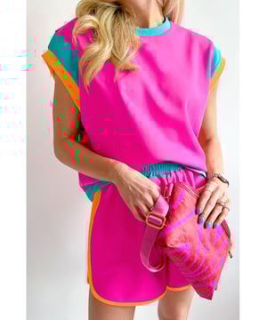 Our styles are designed with a trendy fitted look in mind following an international size standard. For the best fit we suggest choosing one size up from your usual. Be sure to check our sizing chart to find your perfect match!
  Contrast trim creates a colorblock design
  Includes a cap sleeve t
  shirt and elastic waist shorts
  Two
  piece set with a relaxed fit
  Comfortable and stylish for daily wear
  Easy to match and versatile
Material: 95% Polyester 5% Elastane