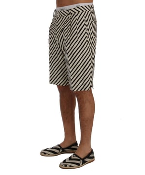 Dolce & Gabbana Casual Shorts with Logo Details
  100% Authentic brand new with tags
  Material: 100% Hemp
  Color: White and black striped
  Two front and two back pockets
  Logo Details
  Made in Italy