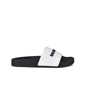 Chanclas Balenciaga de goma blanca y negra.Correa blanca con logotipo de la marca en negro.Suela plana de goma negra.Made in Italy.