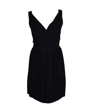 Vestido negro de tirantes Balenciaga.Cinturón de volantes en la cintura.Cierre de cremallera en la espalda.Made in France.