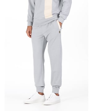 When it comes to sportswear staples, LUKE have you covered with these classic joggers. Crafted from a stretchy tricot with a comfy drawcord waistband, theyre ideal for everyday wear. They are detailed with contrast side welt pockets and are complete with the brands iconic lion head embroidery on the left leg.