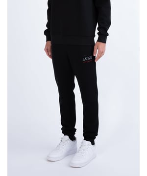 These premium joggers from LUKE MAINLINE are the perfect piece to stay looking stylish on your off-duty days. Constructed from a luxury interlock, they are detailed with dark pewter gloss trims throughout and feature a comfy drawcord waistband and essential size zip pockets. They are then complete with a 3D effect LUKE EST. 1977 embroidery on the left leg.
