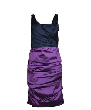 Vestido Dolce & Gabbana azul marino y morado.Cierre de cremallera en la espalda.Detalles de tejido plisado a lo largo.60% seda, 26% poliamida y 8% elastano.Made in Italy.