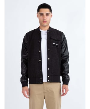 This premium varsity jacket from LUKE MAINLINE is your winter wardrobe staple. Constructed from our luxury Meltech fabrication, it is fully lined, and features contrast recycled PU sleeves. It is styled with shiny pewter snap buttons, soft rib trims throughout and a left chest pocket. This piece features a removable striped tape and is complete with the brands iconic raised metal felt badge.