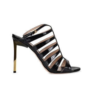 Sandalias de piel negra efecto cocodrilo de Tom Ford.Estilo de tiras. Hebilla en el tobillo.Acabados dorados.Tacón de espejo dorado.Puntera abierta redondeada.Altura del tacón 12 cm.Made in Italy.