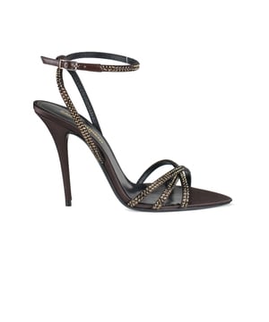 Sandalias Ava Saint Laurent de satén marrón.Adornos de cristal en las tiras.Cierre de hebilla en el tobillo.Punta redonda.Tacón de aguja de 10,5 cm.Made in Italy.