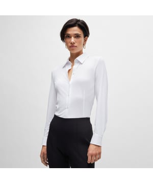 Dames BOSS Boanna Extra-slim-fit blouse van Italiaanse prestatiestretch dobbyEen geavanceerde blouse van BOSS Womenswear met een extra slanke pasvorm van in Italië gemaakte stof met een micro-dobby weving en prestatiestretch kwaliteiten.- Extra-slim-fit- Puntkraag- Lange mouwen met manchetten met knoopsluiting- Knoopsluiting aan de voorkant- 87% Polyamide (gerecycled) 13% Elastan.  Machinewasbaar.- Ref: 50518181-100