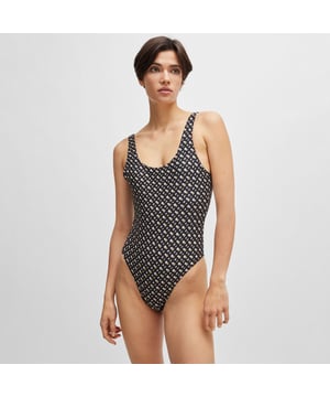 Womens BOSS Mimi Low-back swimsuit with monogram patternA distinctive swimsuit by BOSS  designed in stretch material with all-over monograms  a low-cut back and moulded cups.- Main material: 88% Polyester (recycled)  12% Elastane.  Lining: 72% Polyamide  28% Elastane.  Machine washable.- Ref: 50516429-004Please note that returns will only be accepted if the hygiene label is still attached to the product.