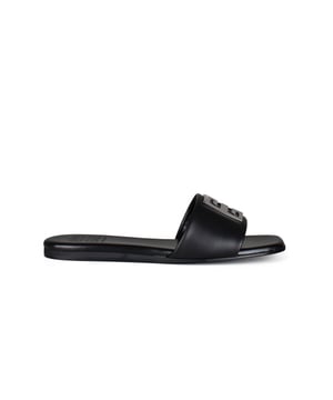 Sandalias Givenchy 4g en piel negro.Correa con placa de 4 g.Suela plana de cuero negro.Puntera abierta.100% piel de cordero.Made in Italy.