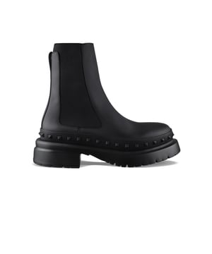 Botas M-Way Rockstud Chelsea de Valentino en piel negra.Tachuelas decorativas negras alrededor de la suela.Lengüeta de piel en la parte trasera.Suela gruesa negra de 5 cm.Puntera redondeada.Made in Italy.