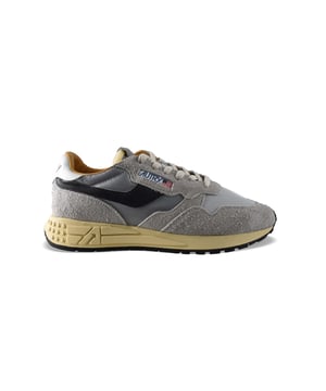 Sneakers bajas Reelwind Autry de nailon y ante gris.Parche con logotipo en el exterior.Banda de cuero negro en el exterior. Contrafuerte de cuero blanco con logotipo.Lengüeta con parche del logotipo.Suela de goma con efecto amarilleado.Logotipo en relieve en la suela. Cierre con cordones.