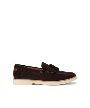 The KG Kurt Geiger Ronan is a slip-on shoe crafted from a brown suede leather. There are antiqued brass branded eyelets on each side with a tassel detail on the toe.