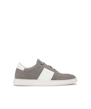 This KG Kurt Geiger pair of Spark sneakers arrive in a grey Nubuck leather with two white stripes either side. The front laces up and there is embossed branding on the heel.