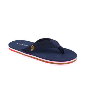 Elevate your down-time wardrobe with these LUKE canvas strap flip flops. They are detailed with the brand's iconic lion head embroidery and are stamped with the LUKE 1977 graphic on the sole.