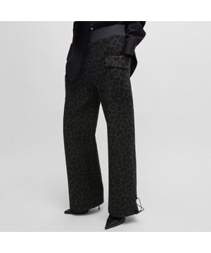 Womens NAOMI x BOSS Animal-print Tracksuit Bottoms with energear™Printed adjustable-hem tracksuit bottoms by NAOMI x BOSS. A relaxed-fit style featuring anti-stress energear™ technology  which returns the body’s own energy  emitted in the form of far infrared rays. The energy harnessed in this way can have a positive effect and provide a feeling of calm.  Part of an exclusive capsule  co-created with Naomi Campbell  designed with elegance  confidence  and on-the-go ease in mind.- Relaxed fit- Elastic waistband- Wide leg- Flap pockets- 80% Cotton  14% Polyester  6% Elastane.  Machine washable.- Ref: 50527283-007