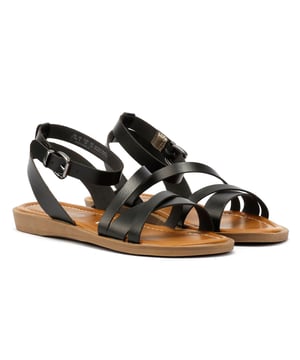 Strappy sandals crafted with a PU faux leather upper for a stylish, vegan-friendly finish. Designed with an adjustable ankle strap and secure buckle fastening for a custom fit. Stylish lightweight and versatile.