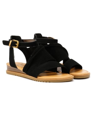 Stylish sandal featuring a durable PU upper for a sleek look, that mimics the softness of suede. Designed with an adjustable ankle strap and buckle fastening for a secure fit. Finished with a subtle wedge heel for added height and everyday comfort. Vegan