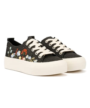 Elevate your style with our eco-friendly platform trainers featuring stunning floral embroidery on the textile upper. Enjoy all-day comfort with a cushioned footbed crafted from sustainable BLOOM Foam containing algae.