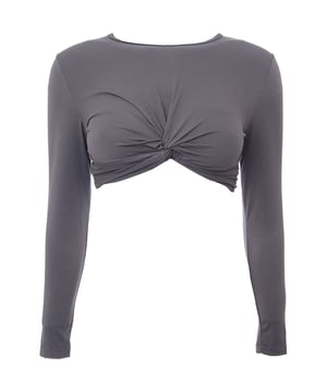 Elevate your activewear with the South Beach Women's Yoga Twist Front Long Sleeve Crop Top in Grey. This stylish crop top combines comfort, flexibility, and modern design, making it perfect for yoga, Pilates, or casual athleisure looks. The twist-front detail adds a fashionable touch, while the long sleeves provide coverage and warmth during cooler sessions. Crafted from a soft, stretchy fabric, it offers a flattering fit that moves with your body, ensuring freedom of movement and support. The versatile grey color pairs easily with leggings, shorts, or jeans, making it a must-have addition to your workout wardrobe or everyday outfits.

Soft, stretchy fabric for comfort and flexibility

Twist-front design for a stylish, on-trend look

Long sleeves for added coverage and warmth

Cropped length for a flattering, contemporary silhouette

Ideal for yoga, Pilates, or casual athleisure wear

The South Beach Women's Yoga Twist Front Long Sleeve Crop Top in Grey is the perfect combination of style and functionality, making it a must-have for the active woman who loves to look great while staying comfortable.