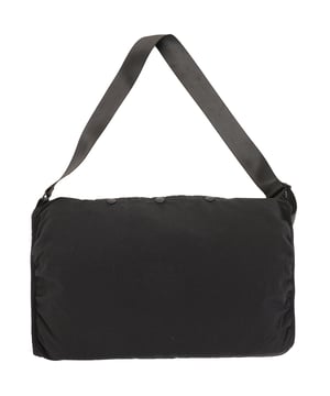 100% Canvas Suspended from an adjustable strap, Raey's black mega muff is made from quilted canvas fitted with a snap-button pocket