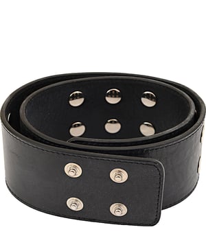 Add a sleek, edgy touch to any outfit with the RAEY Women's Flat Stud Leather Belt in Black. Made from 100% premium leather, this belt offers both durability and style. The flat stud detailing along the strap adds a subtle, contemporary twist to the classic black leather design, making it the perfect accessory to elevate both casual and dressed-up looks. Whether cinching a dress or complementing a pair of trousers, this belt is a versatile, timeless addition to your wardrobe.