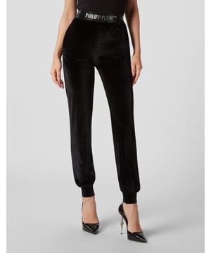 con cristales  ¿Ves qué originales son estos joggers de chenilla con preciosos detalles?   Suave terciopelo de chenilla   Cintura elástica con marca enjoyada   Dos bolsillos con aberturas   Puños inferiores
