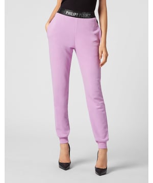con cristales  ¿Ve qué originales son estos joggers de vellón de algodón con preciosos detalles?   Suave forro polar de algodón   Cintura elástica con marca enjoyada   Dos bolsillos con aberturas   Puños inferiores de punto elástico