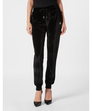 ¿Ve lo originales que son estos pantalones de jogging de chenilla?   Chenilla elástica suave   Letras de la marca con strass en la parte posterior. Dos bolsillos con aberturas   Cinturilla de punto acanalado con cordón de ajuste   Puños inferiores de punto acanalado