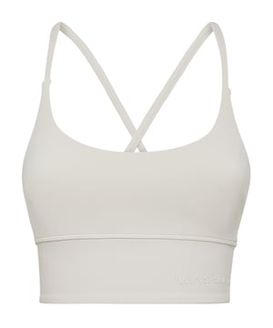 Comfortable and light-weight top designed to help you push your limits.   Maximum comfort and quick dry solid color Lycra®   Support especially designed for gym training   Crisscross straps on the back   The rib knit bottom hem grants support and firmness