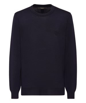 Explore new ways of expressing elegance with this season’s suggestions. Like this knit wool crewneck pullover. Look at the details.   12/14-gauge plain knit extrafine wool   Crest embroidered at left chest   The Brand initial embroidered on the hang loop sewn at yoke   Rib knit hems