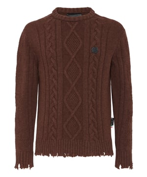Innovación y creatividad son las raíces del estilo de Plein. Descubra las características de este jersey original de cuello redondo de lana suave.   Lana de cordero de 5 galgas tejida por cable y otros puntos.   El icónico Skull&Bones está tejido en jacquard en la espalda y las letras aparecen en las mangas.   Parche de cuero saffiano PP Hexagon cosido en el pecho izquierdo    Etiqueta con logotipo cosida en el canesú   Tejido de punto elástico, dobladillos sin rematar