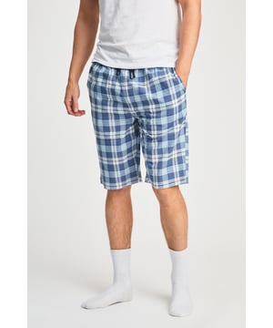 These Tokyo Laundry boxer-style checked lounge shorts are made from 100% cotton with a garment-washed finish for ultimate comfort. Designed with an elastic waistband and adjustable drawstring, they offer a relaxed fit, making them perfect for everyday lounging. Stylish, breathable, and effortlessly casual.