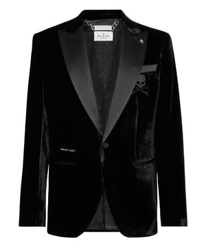 Add some glam to your wardrobe. Check out this velvet evening blazer with details that make it stand out.   Smooth velvet fabric   Satin peak lapel   Skull & Bones embroidered at left chest   Satin lined single button with Logo embroidered   Two satin trim finished slit pockets   Single vent   Inner lining