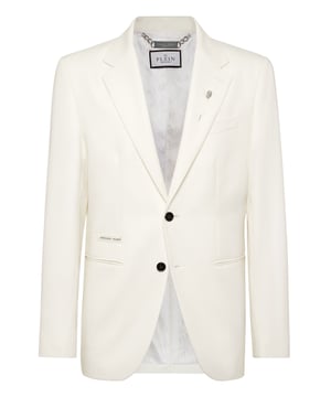 Bringen Sie Originalität in Ihre Garderobe. Sehen Sie sich diesen leichten Wollblazer mit Details an, die ihn auffallen lassen.   Leichte Wolle   Zwei Knöpfe zum Verschließen   Zwei Eingrifftaschen   Einfacher Schlitz   Innenfutter