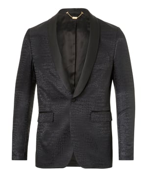 Jacke aus Jacquard-Wolle mit einem Knopf. Seidensatin am Revers und Pattentaschen. Mit Seidensatin bedeckte Knöpfe. Klapptaschen. Komplett gefüttert. Drei Taschen innen. Ein Schlitz hinten.