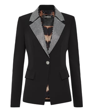 Verfraaid  Blazer van stretch polyester met enkele knoop en strassteentjes. Figuurlijke pasvorm en gewatteerde schouders. Juweelknoop.  Twee klepzakken. Binnenvoering.