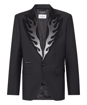 Add a spark to your wardrobe. Check out this wool canvas evening blazer with details that make it stand out.   Light wool canvas   Satin peak lapel with rhinestoned flame décor   Satin lined single button with embroidered Skull & Bones   Two satin flapped pockets   Double vent   Inner lining