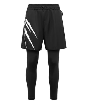 These 2-in-1 joggers are the perfect match to meet achieve your goals. Comfort and performance add up to the style of Plein Sport.   Nylon and stretch techno jersey   Rib knit waistband with drawstring   The iconic Tiger Scratch is printed on the right leg of nylon shorts   Leggings help keep a constant temperature throughout the training’s active phase   Two slit pockets