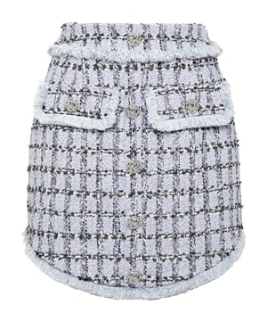 Chique & Rock stijl? Dan is deze rok echt iets voor jou. We hebben tweed opnieuw ontworpen volgens de stijl van Plein. Bekijk de details.   Tweed van katoenmix   Metalen juweelknopen   Twee faux opgestikte zakken   Onzichtbare ritssluiting aan de linkerkant   Gerafelde zomen   Binnenvoering   Asymmetrische onderkant