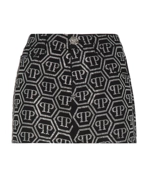 Deze luxueuze denim minirok van Philipp Plein herdefinieert hedendaagse elegantie met de opvallende versiering van het strass-monogram. Het is een fascinerend stijlstatement voor fashion-forward looks.   Vervaardigd van eersteklas denimkatoen voor uitzonderlijk comfort en duurzaamheid.   Verfraaid met prachtige glasvezel strass monogram details voor een verfijnde schittering.   Gaat moeiteloos over van chic overdag naar glamour 's avonds.   Ideaal om te combineren met elegante tops, blazers of opvallende schoenen.   Verhoogt elke outfit met een onmiddellijke luxueuze touch.