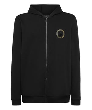 Personalize your active time with this fleece hoodie jacket. A few graphic elements are all it takes to define the style of Plein Sport. See what we’ve created for this season.   Blend cotton fleece with gauzed lining   Zip fastener    Patch with Tiger sewn at left chest   Foil print at left chest   Two slit pockets   Rib knit hems