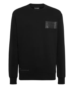 Personalize your active time with this fleece crewneck. A few graphic elements are all it takes to define the style of Plein Sport. See what we’ve created for this season.   Cotton blend fleece with gauzed lining    Brand lettering printed on the left chest and back   Rib knit hems