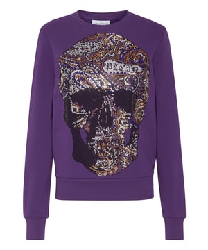 La originalidad y el estilo también se encuentran en un jersey de jogging de cuello redondo. Echa un vistazo a esta versión de forro polar de algodón decorada con... Más información.    Suave forro polar de algodón   La icónica calavera con pedrería Paisley en la parte delantera   Estampado Brand de estilo gótico en el canesú   Dobladillos de punto elástico