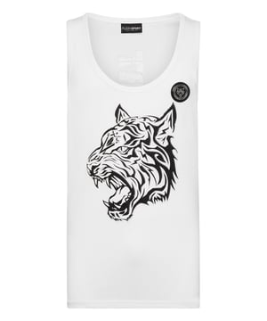 Un poco es suficiente para personalizar tu estilo también mientras entrenas o haces footing. Descúbrelo con esta camiseta de tirantes.   Corte holgado gracias a la flexibilidad natural del jersey de algodón.   Estampados de la marca y del Tigre en la parte delantera y trasera   Parche de Tigre engomado cosido en el pecho izquierdo   Dobladillos cosidos a dos agujas
