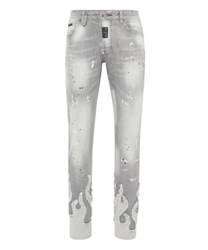 For your outfit we recommend these denim jeans with precious elements.                                                               Wear-and-tear denim   Flame-shaped patches sewn on leg bottoms    Logo Patch sewn on the right rear pocket   Single metal button fastening   Fit: Super Straight